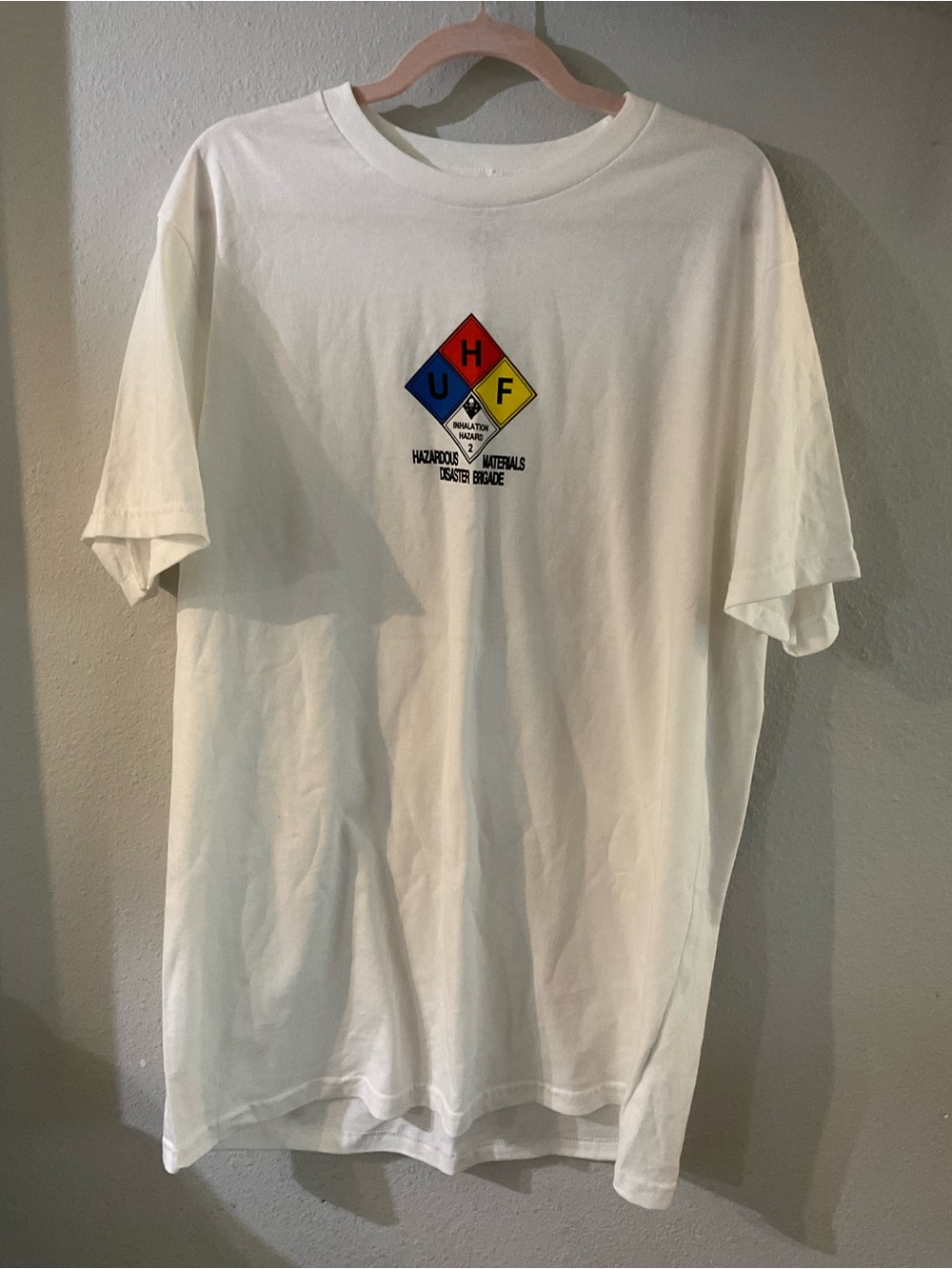 HUF White Short-Sleeve Tee with Red/Blue/Yellow Hazard Logo
